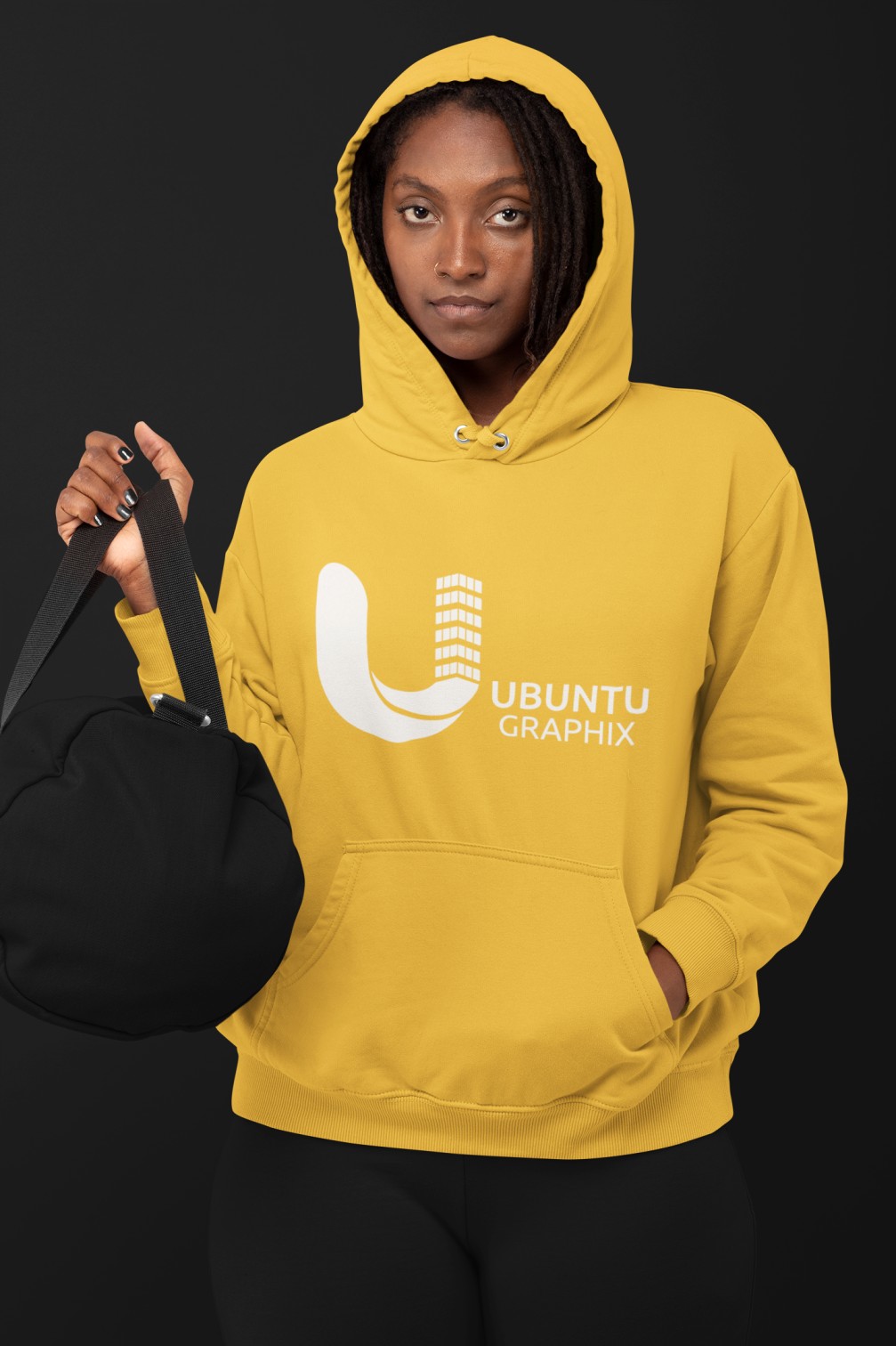 hoodie-mockup-featuring-a-woman-in-a-monochromatic-outfit-at-a-studio